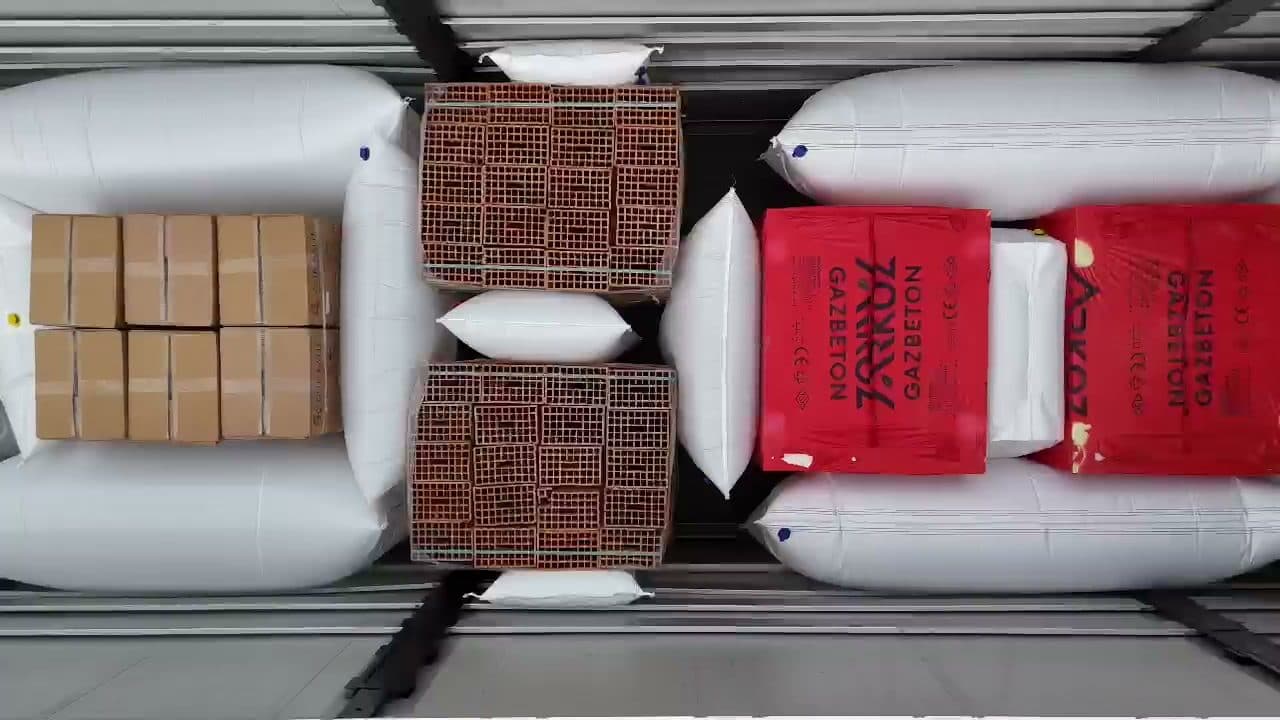 Bags filling the void space between mixed pallets to stop movement in transit.